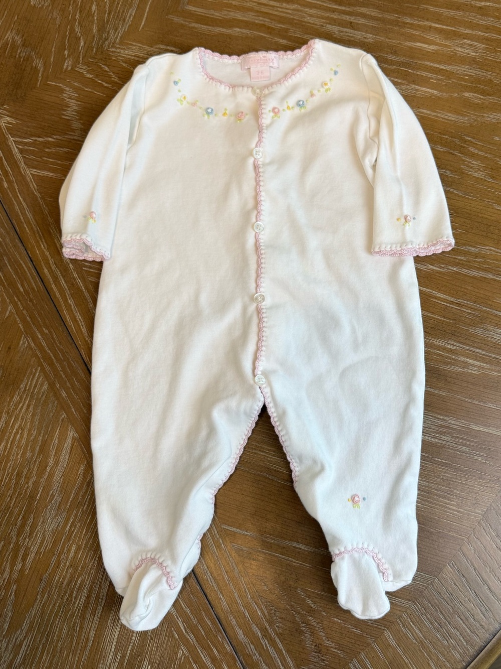 Kissy Kissy Baby One-Piece Footed Sleeper with Pink and floral embroidered Trim